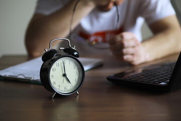 Alarm clock on the table. Time concept. Being late for work and school.