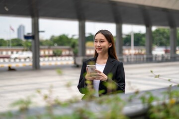 Young woman using phone outdoor