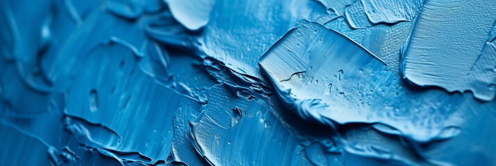 Abstract blue paint texture background with dynamic strokes and depth, suitable for artistic concepts and design elements