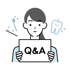 Q&Aボードを持つ女性歯科衛生士
