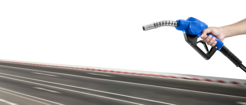 Hands holding a fuel nozzle and the blur the street, transparent background