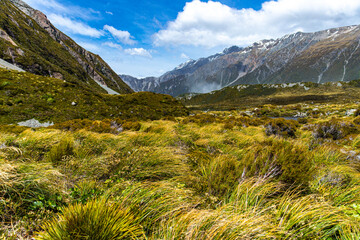 panorama of famous hooker valley trail from mount cook village to hooker lake, scenic hike in southern alps, canterbury, new zealand south island