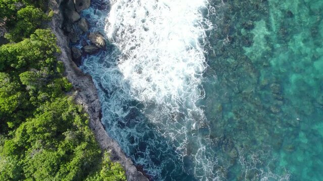 Top View Of Rough Waves Hitting On The Rocks In Porte d'Enfer, Guadeloupe, France. Aerial Shot