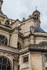 Fototapeta na wymiar Detail of the buttresses of the gothic church Saint Eustache in Paris