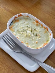 Baked Spinach with cheese delicious Italian food cuisine.