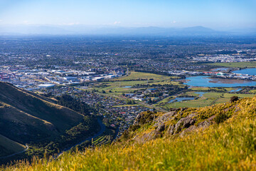 panorama of christchurch city as seen from the gondola summit, bridle path with scenic view of the city, canterbury, new zealand south island