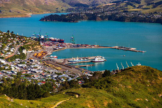 panorama of farmous lyttelton harbor and banks peninsula seen from the bridle path near gondola summit, christchurch, canterbury, new zealand south island