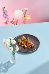 Chinese-style sweet and sour carp with vegetables; an artistic food presentation set against a surreal seasonal backdrop