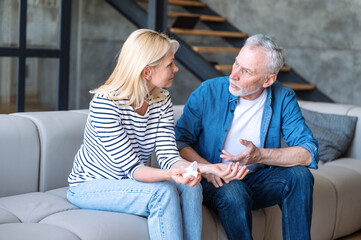 Mature couple has disagreements and try to understand each other