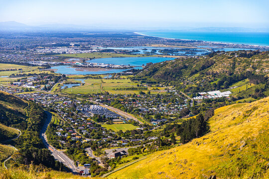panorama of christchurch city as seen from the gondola summit, bridle path with scenic view of the city, canterbury, new zealand south island