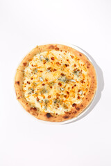 Top View of Italian Quattro Formaggi Pizza with Four Cheeses on White