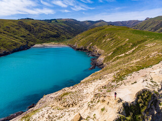aerial panorama of tumbledown bay, banks peninsula near christchurch, canterbury, new zealand south...