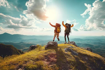 Foto op Canvas Hikers with backpacks jumping with arms up on top of a mountain - Couple of young happy travelers climbing the peak - Family, travel and adventure, Generative AI © Pixel Nirvana