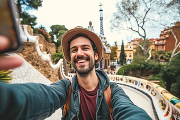 Foto op Plexiglas Happy tourist take selfie self-portrait with smartphone in Park Guell, Barcelona, Spain - Smiling man on vacation looking at camera - Holidays and travel, Generative AI © Pixel Nirvana