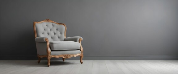 an empty upholstered armchair against a gray wall with a place to copy