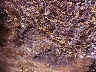 Ethereal underwater seabed clear shiny water with pebbles