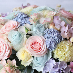 Delicate spring bouquet of pink peonies, chrysanthemums, roses, carnations and other flowers, bouquet and gift idea