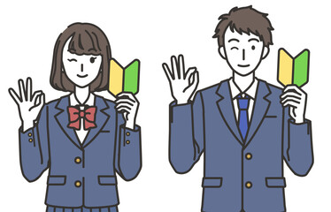 初心者マークを持つ男子と女子