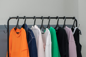 clothes hanger rack with casual textile wear at home