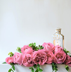 Bouquet of red roses on the table