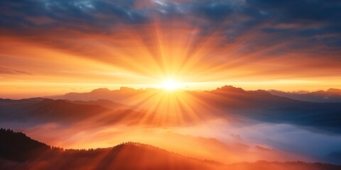 Fototapeta premium Sunbeams Peeking Through Misty Peaks.