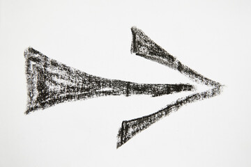 Thick graceful smooth Hand drawn black chalk arrow. The concept of business, choosing direction, moving forward. Abstract sign, background, texture. Blurred