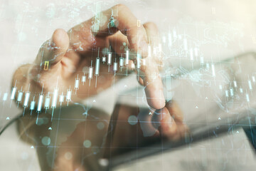 Double exposure of abstract creative financial diagram with world map and with finger clicks on a digital tablet on background, banking and accounting concept