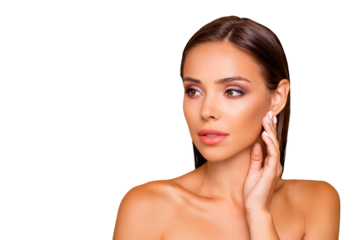 Graceful pretty well-groomed charming lady with naked shoulders look aside she stand isolated on pastel beige background with copy space for text she touch her face by hands