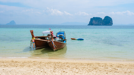 Longtail boats on the beach of Koh Ngai island tropical Island in the Andaman Sea Trang in Thailand