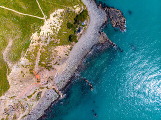 aerial panorama of godley heads near christchurch and lyttelton, canterbury, new zealand; turquoise...