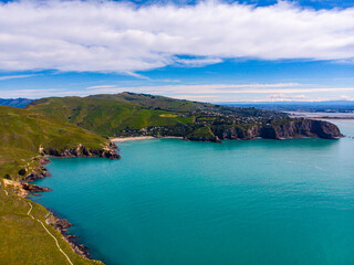 Fototapeta na wymiar aerial panorama of godley heads near christchurch and lyttelton, canterbury, new zealand; turquoise water and large cliffs