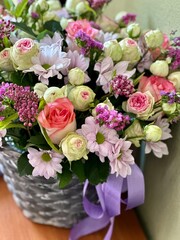 Peonies, roses, tulips flower spring holiday flowery pastel background, minimal flowery banner, floral still life with pink red blooming flowers on beige colored, nature frame wallpaper