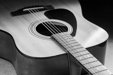 Classical guitar close up. Acoustic guitar on wood background.Music instrument concept