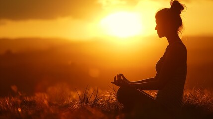 Woman practices yoga and meditates on the nature