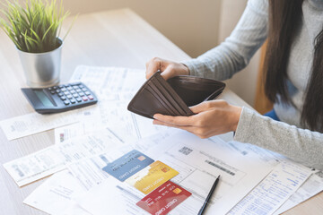 Debt financial concept, stressed problem asian woman hand open empty wallet, purse not have budget of money to pay no have credit card, not able payment bill, loan or expense with bank, bankruptcy.