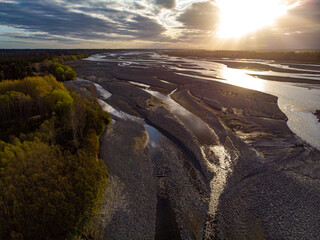 aerial panorama of waimakariri river near christchurch, north canterbury, new zealand; sunset over...