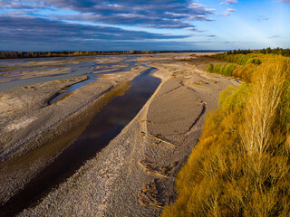 aerial panorama of waimakariri river near christchurch, north canterbury, new zealand; sunset over...