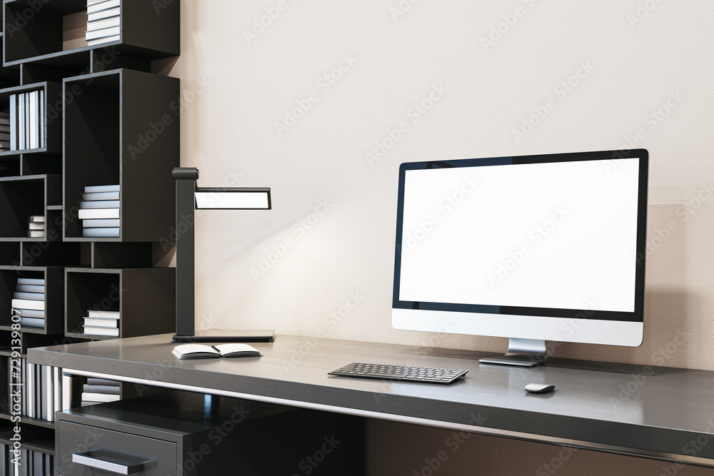 Poster close up of designer office interior with creative wooden bookcase, empty white computer monitor and