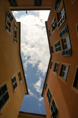 Sky in a gap between houses, bottom view