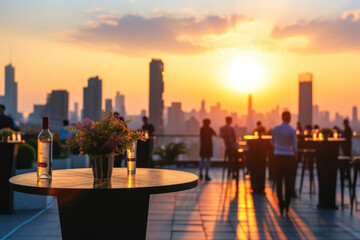 An elegant evening networking event on a rooftop terrace with a city skyline at sunset, exemplifying the concept of a corporate social gathering