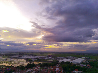 Sunset View. Aerial Photography. Picturesque Panoramic Aerial sky in the afternoon. Shot from a drone flying 200 meters high. Cikancung, Indonesia