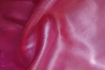 Jammed smooth cold pink satin polyester fabric