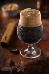 Stout Beer. Glass of cold dark beer.