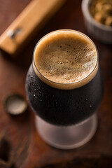 Stout Beer. Glass of cold dark beer.
