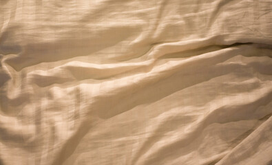 woven or felted fabric made from wool, cotton, or a similar fiber.