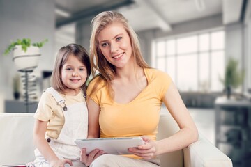 Mother and child sitting at home room