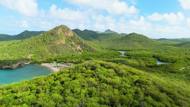 Panoramic aerial dolly to Santa Cruze beach with Christoffelberg and hills of Westpunt Curacao