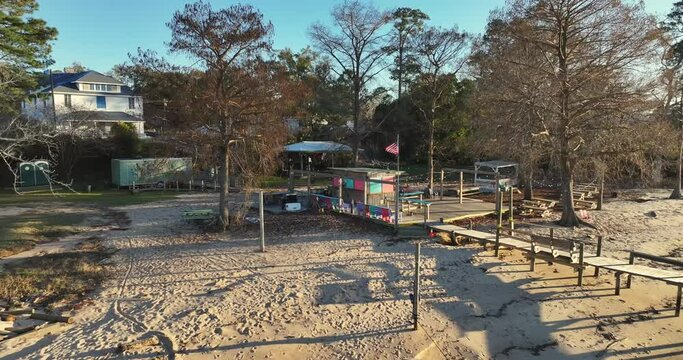 Reverse drone view of the Tiki Bar behindd the American Legion in Fairhope, Alabama
