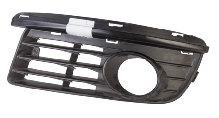 bumper grille for anti fog light on a white background made of plastic is an element of the car body that protects and passes air to the engine. Design element and tuning replacement in the workshop.