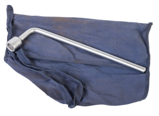 Wheel wrench and transportation hook on a blue cover for car repair on the road in the absence of insurance on a white isolated background.